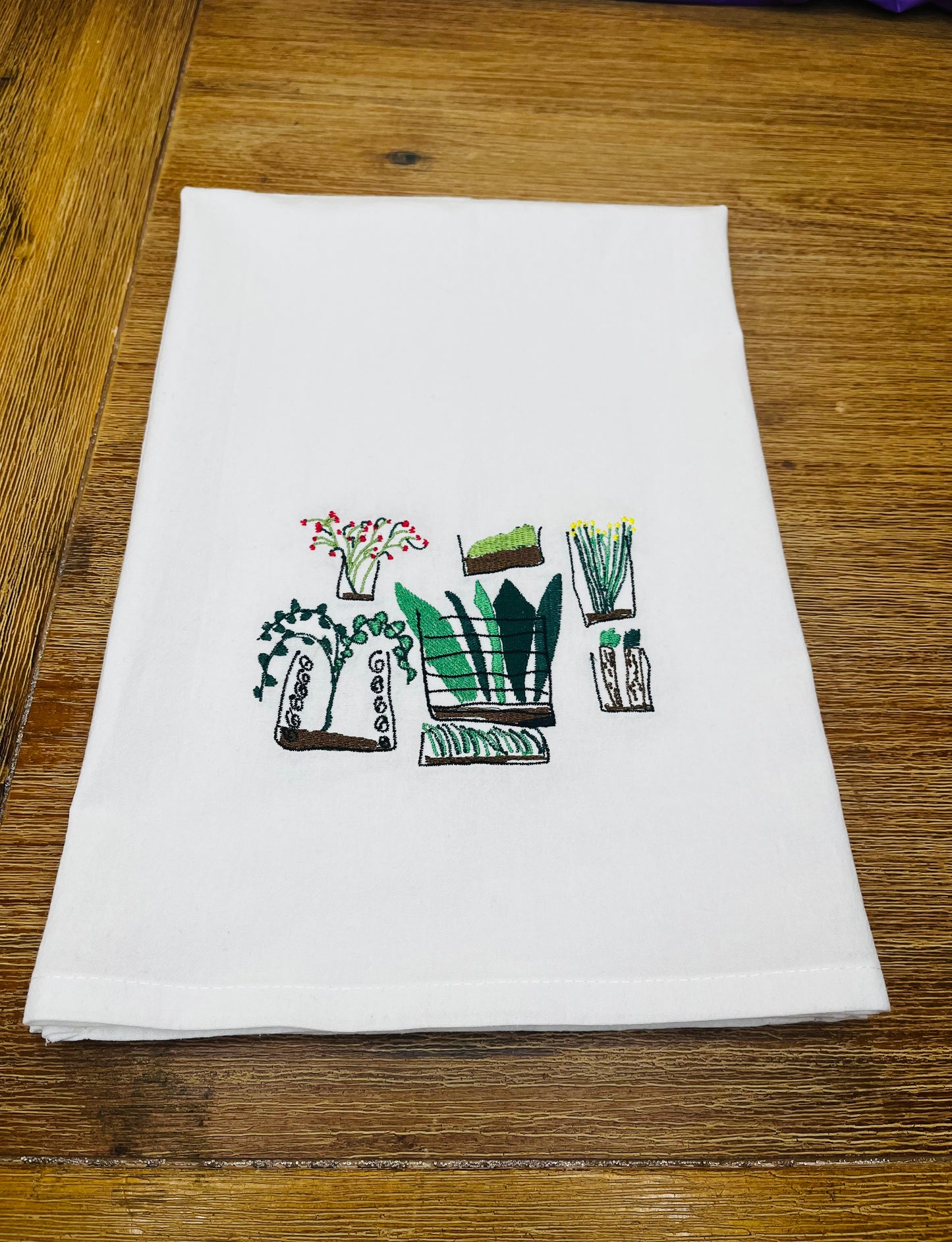 Custom embroidered kids' artwork, perfect for personalized gifts or home decor.