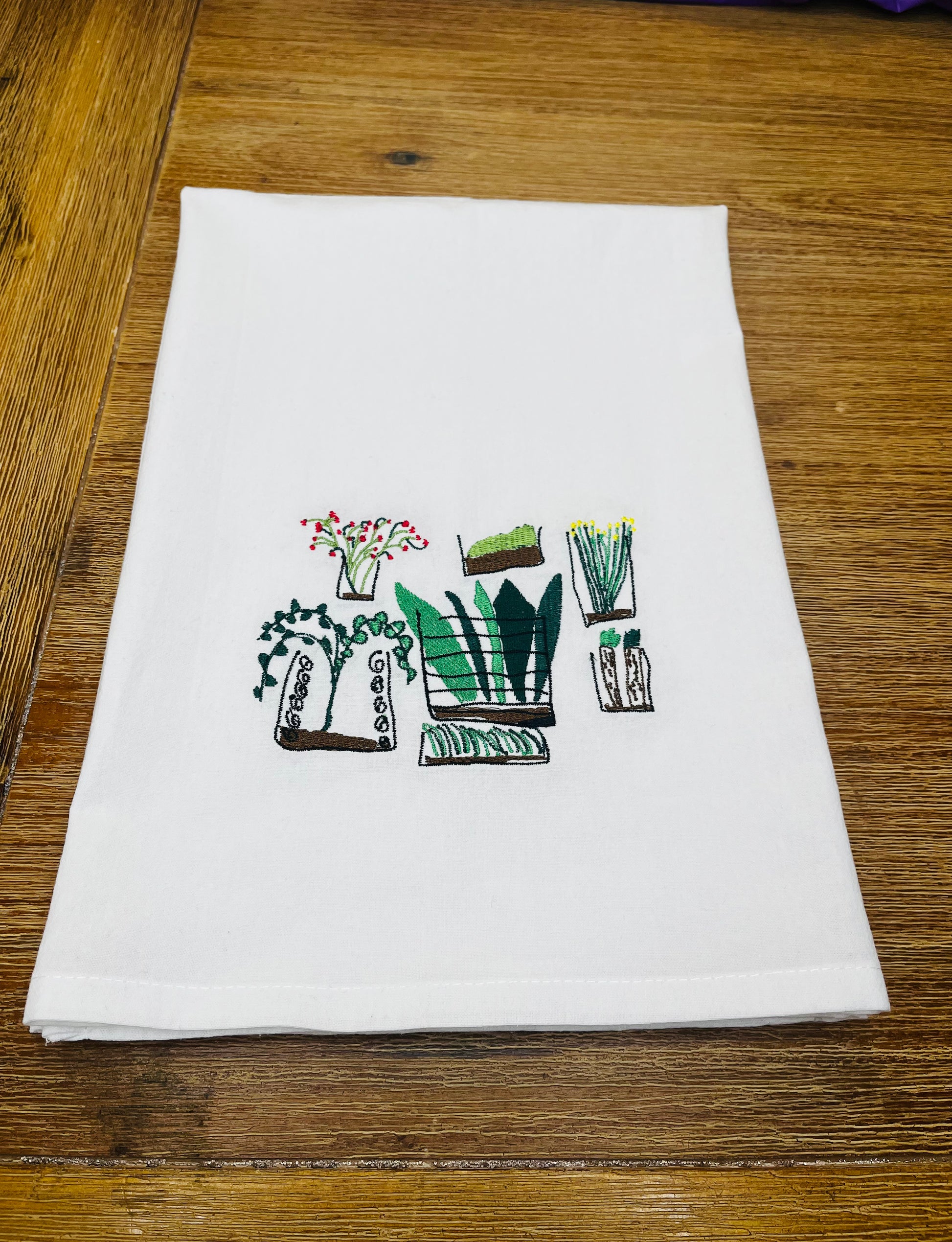 Custom embroidered kids' artwork, perfect for personalized gifts or home decor.