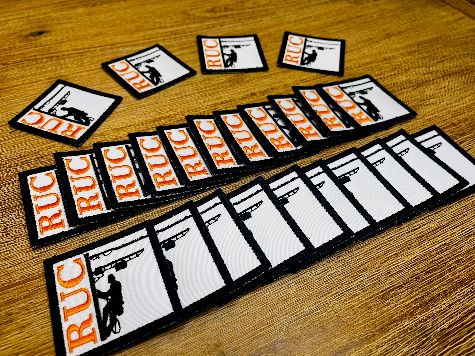 Personalized iron on embroidered patches, perfect for business logos or team uniforms.